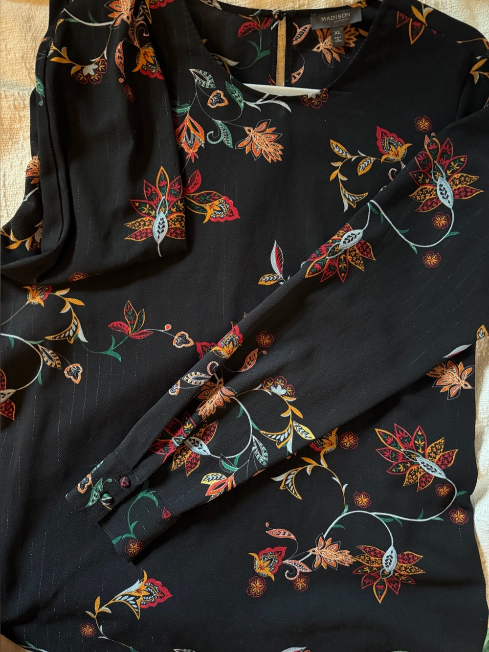 Madison blouse with black and floral. All seasons in size XL